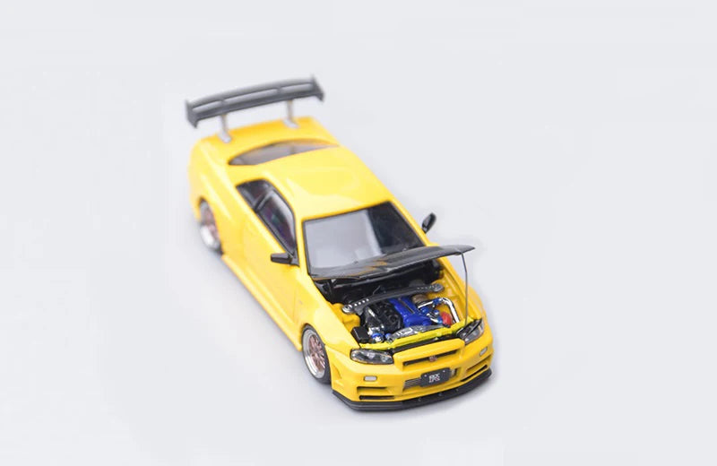 Focal Horizon FH 1:64 Skyline R34 Z-Tune with High Wing Carbon-Hood Bayside Blue / Yellow Diecast Model Car