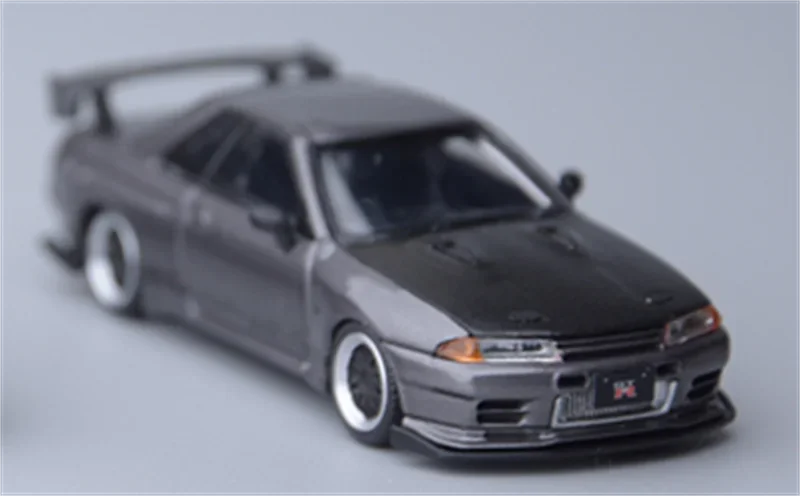 Focal Horizon 1:64 Top Secret VR32 White / Grey with Carbon Hood Diecast Model Car