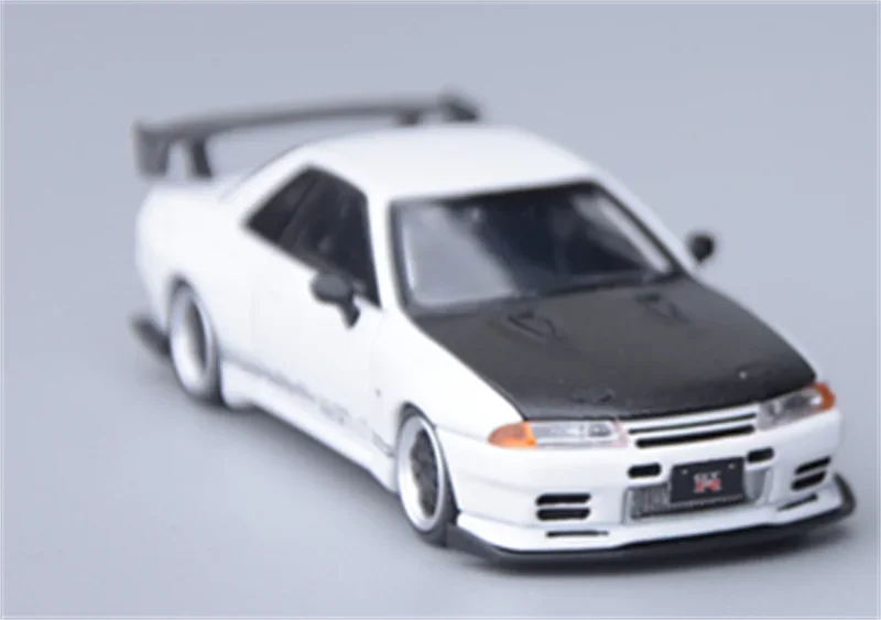 Focal Horizon 1:64 Top Secret VR32 White / Grey with Carbon Hood Diecast Model Car